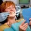 north york dentist assisting patient with dentures